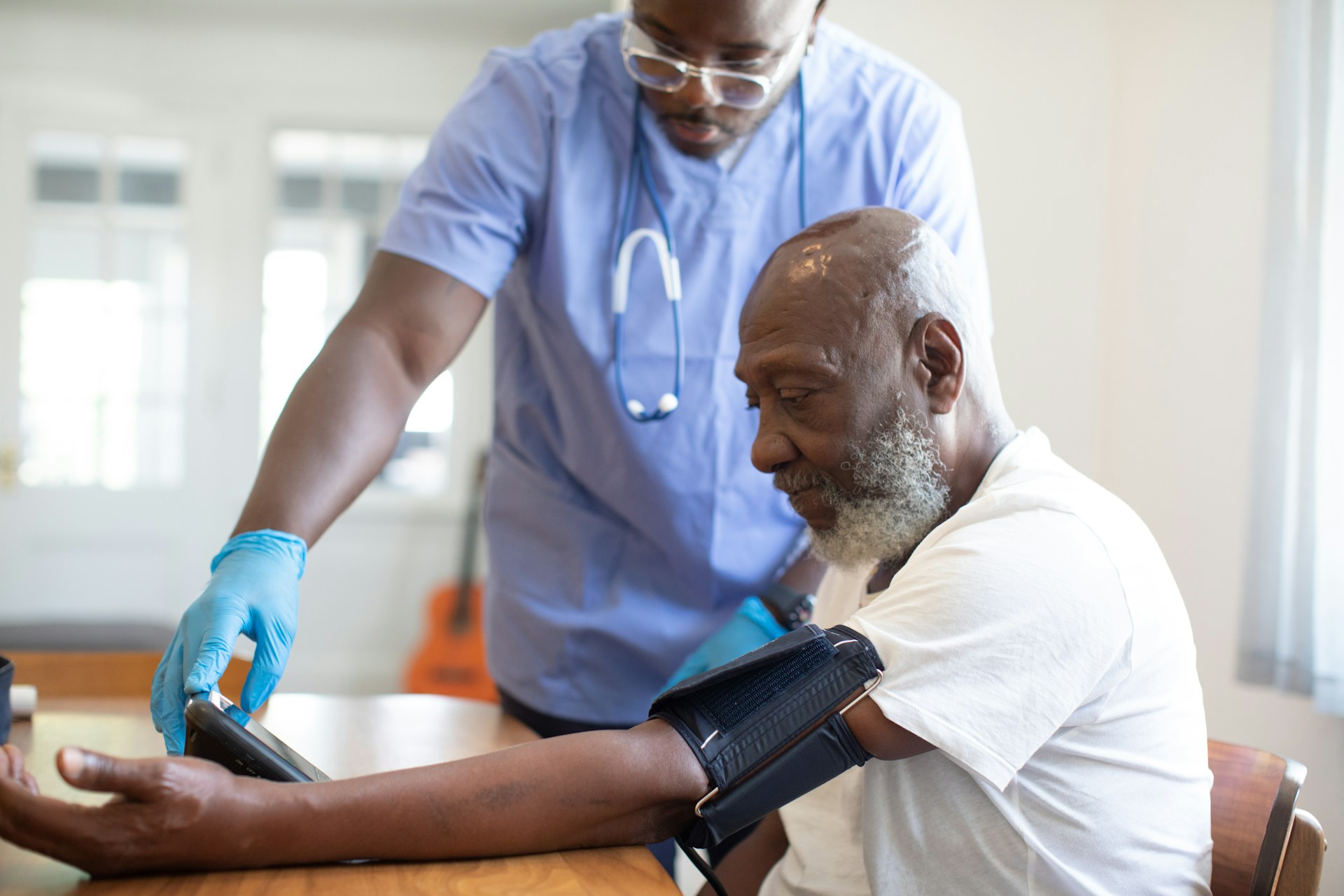 nappy-dcBO4nt4MRE-unsplash nurse checking patient's blood pressure
